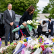 BUFFALO, NY - MAY 28: Vice President Kamala Harris and Second Gentleman Doug Emhoff pay their respects at a memorial at Tops Friendly Market, which was the site of a mass shooting, on Saturday, May 28, 2022 in Buffalo, NY.